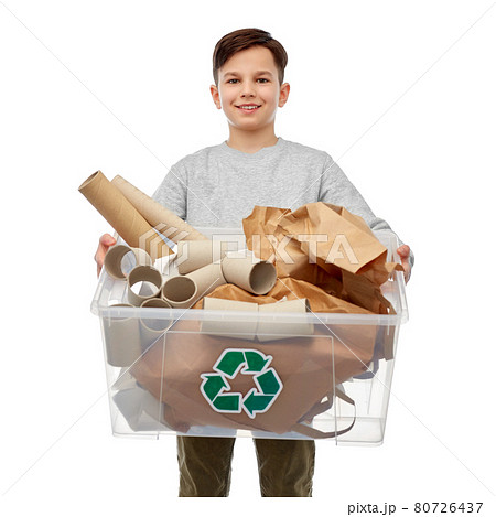 smiling boy sorting paper waste smiling boy sorting paper waste 80726437