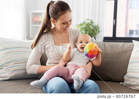 happy smiling mother with little baby at home 80726767