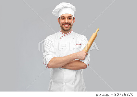 happy smiling male chef or baker with rolling pin 80726870