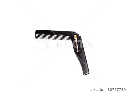 Black folding comb, isolated on a white background Black folding comb, isolated on a white background 80727720