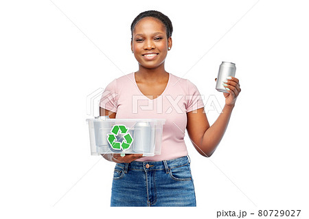 african american woman sorting metallic waste 80729027
