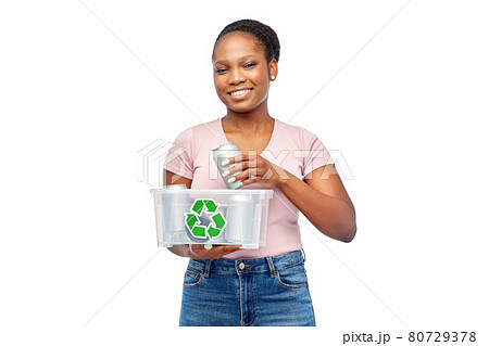 african american woman sorting metallic waste 80729378