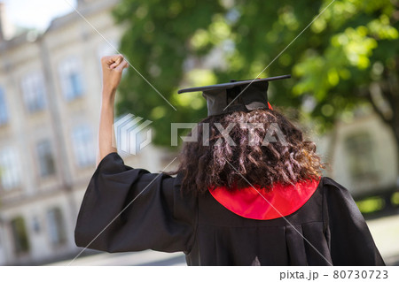 A female student feeling awesome about college graduation A female student feeling awesome about college graduation 80730723