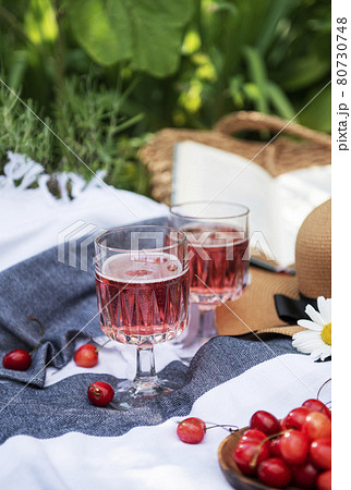 Set for picnic on blanket in lavender field 80730748
