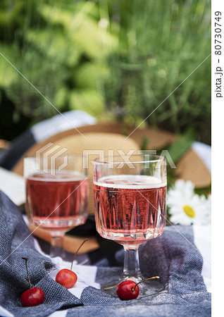 Set for picnic on blanket in lavender field Set for picnic on blanket in lavender field 80730749