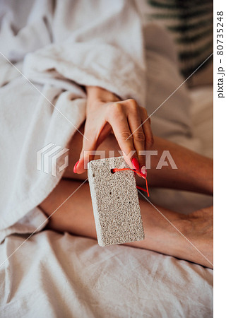 Pumice stone in the bathroom 80735248