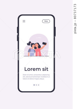 Two girls taking selfie on smartphone Two girls taking selfie on smartphone 80737173