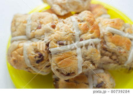 Traditional hot cross buns, bread with characteristic decoration in the shape of a cross Traditional hot cross buns, bread with characteristic decoration in the shape of a cross 80739284