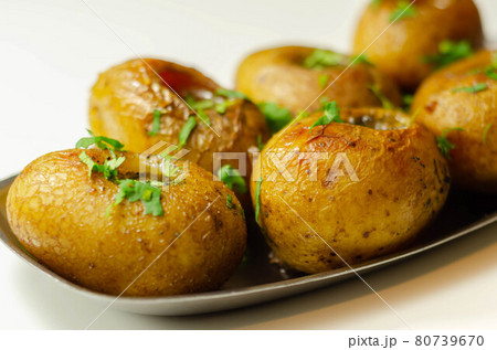 Mini jacket potatoes with a fragrant garlic...の写真素材 [80739670] - PIXTA