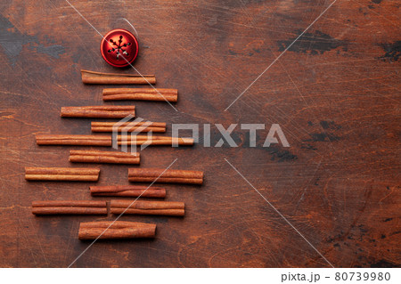 Christmas card with fir tree shaped cinnamon spice and decor 80739980