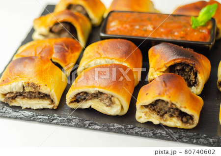 Patty's pies stuffed with minced meat, mushrooms and onion, served with sauce 80740602