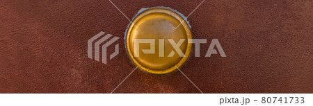 Closeup on a round door handle with decorative elements, door decoration 80741733