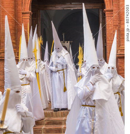 People participating in the Holy Week procession in a Spanish city during Easter People participating in the Holy Week procession in a Spanish city during Easter 80742003