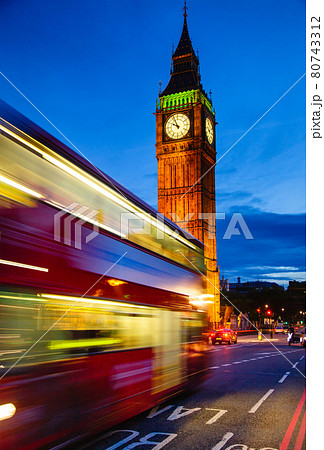 London night traffic scene with Double Decker bus moves along illuminated Elizabeth Tower aka Big Ben on the Westminster Bridge London night traffic scene with Double Decker bus moves along illuminated Elizabeth Tower aka Big Ben on the Westminster Bridge 80743312
