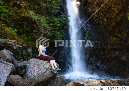 Adult Woman hiker at Norvan Falls Adult Woman hiker at Norvan Falls 80745149