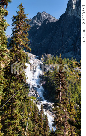 Waterfall cascading down a rocky mountain cliff in Canadian Nature Landscape. 80745231