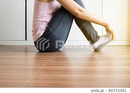 Woman receiving feet massaging and soles for plantar fasciitis 80753301