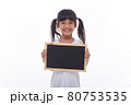 little Asian child show the black board on isolated background 80753535