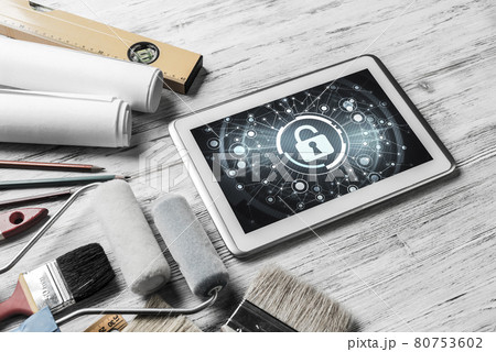 Web security and technology concept with tablet pc on wooden tab 80753602