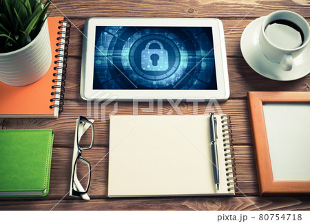 Web security and technology concept with tablet pc on wooden tab 80754718