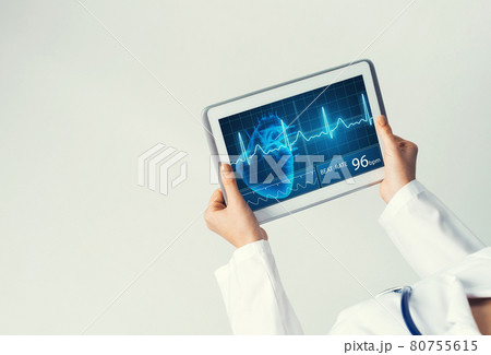 Close of female doctor hands working with tablet pc computer 80755615
