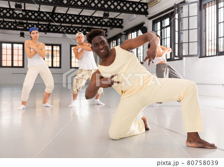 dancers training in a dance studio 80758039