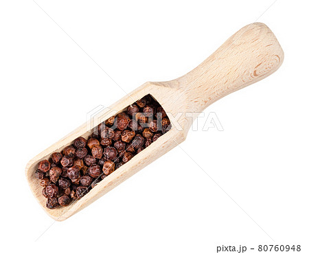 red Kampot pepper in wood scoop cutout red Kampot pepper in wood scoop cutout 80760948