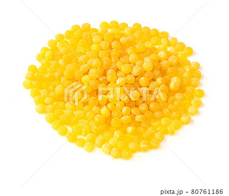 pile of uncooked ptitim closeup on white 80761186