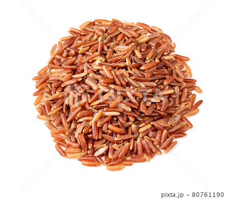 pile of raw red rice closeup on white pile of raw red rice closeup on white 80761190