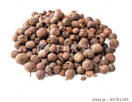 pile of allspice (jamaica pepper) closeup on white pile of allspice (jamaica pepper) closeup on white 80761385