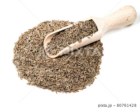 wooden scoop on pile of kala zeera seeds on white wooden scoop on pile of kala zeera seeds on white 80761428