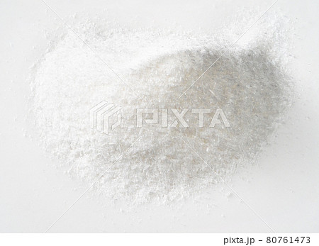 pile of crystalline monosodium glutamate on white 80761473