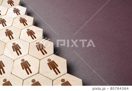 Hexagons with people in a structural order. Formation of company personnel, staffing. Hiring new employees and recruiting staff. Personnel management. Unity. Team discipline, teamwork cooperation. 80764364