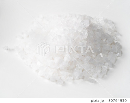 handful of coarse sea salt closeup on white handful of coarse sea salt closeup on white 80764930