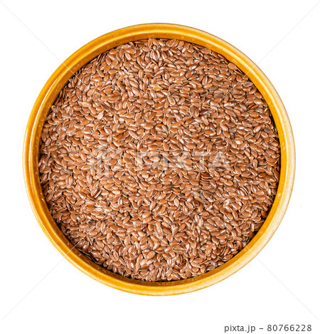 top view of brown flax seeds in round bowl cutout 80766228