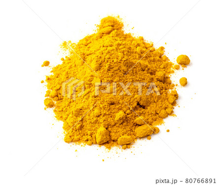 handful of Turmeric powder closeup on white 80766891