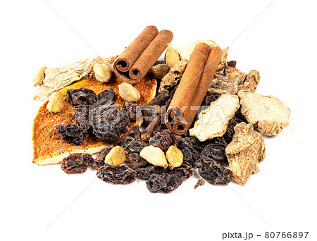handful of Mulling spices closeup on white 80766897