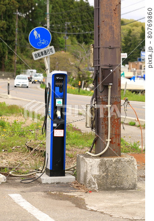 Electric vehicle charging station on service at lake inawashiro. Electric vehicle charging station on service at lake inawashiro. 80769860