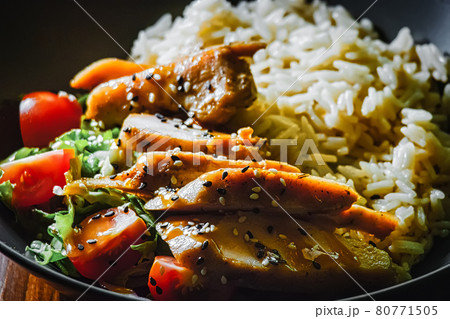 Indian curry spacy food. Chicken breast on basmati rice with vegetables 80771505