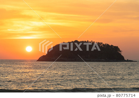 beautiful cloud in golden sky at sunset in Kata beach Phuket Thailand. beautiful cloud in golden sky at sunset in Kata beach Phuket Thailand. 80775714