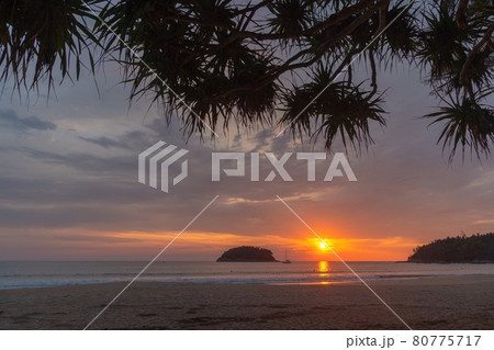 stunning red sky at sunset in Kata beach Phuket Thailand.. stunning red sky at sunset in Kata beach Phuket Thailand.. 80775717