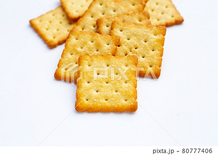 Dry cracker cookies on white background. Dry cracker cookies on white background. 80777406