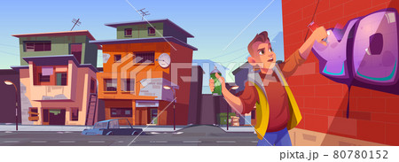 Man with spray draws graffiti in ghetto area Man with spray draws graffiti in ghetto area 80780152