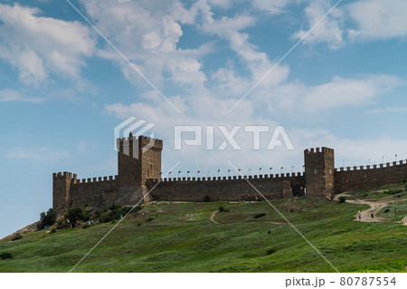 The Republic of Crimea. July 12, 2021. An ancient Genoese fortress located on a mountain in the city of Sudak. The Republic of Crimea. July 12, 2021. An ancient Genoese fortress located on a mountain in the city of Sudak. 80787554
