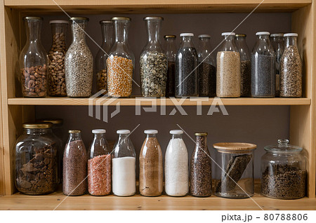 Glass jars with cereals in an eco friendly store. The concept of a grocery store without plastic disposable packaging 80788806