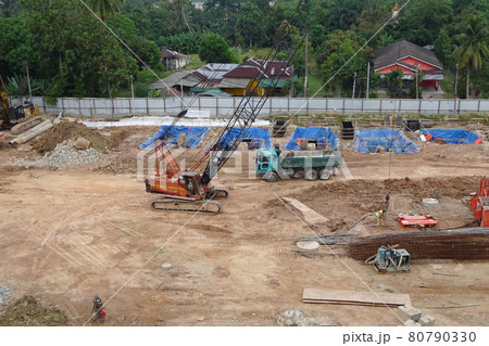 MALACCA, MALAYSIA -AUGUST 24, 2016: Construction site in progress at Malacca, Malaysia during daytime. Daily activity is ongoing. MALACCA, MALAYSIA -AUGUST 24, 2016: Construction site in progress at Malacca, Malaysia during daytime. Daily activity is ongoing. 80790330