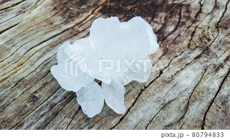 Alum on wood plank. Concept for body deodourant and vegetable preservation 80794833