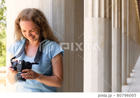 Tourist in Stoa of Attalos, Athens, Greece, Europe Tourist in Stoa of Attalos, Athens, Greece, Europe 80796005