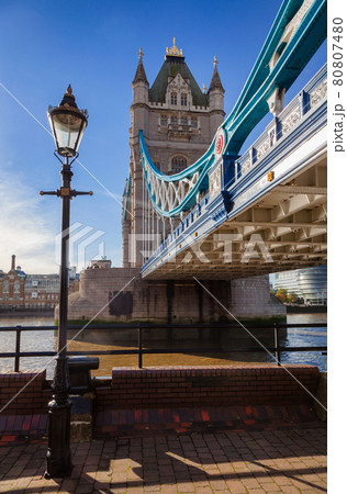 London cityscape with Tower Bridge over the River Thames and lamppost London cityscape with Tower Bridge over the River Thames and lamppost 80807480