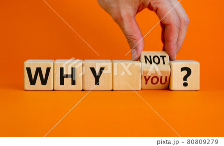 Why not you symbol. Businessman turns a cube and changes words why you to why not. Beautiful orange background. Business and why not you concept. Copy space. Why not you symbol. Businessman turns a cube and changes words why you to why not. Beautiful orange background. Business and why not you concept. Copy space. 80809279